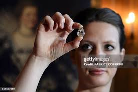 A model poses with the Beau Sancy diamond during a Sotheby's auction...  News Photo