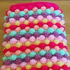 The bobble stitches give this blanket a lightweight feel for warmer days, with the cozy look of a warmer blanket. Crochet Baby Girl Bobble Blanket Free Pattern Crochet Blanket Girl Crochet Baby Baby Girl Crochet Blanket