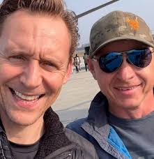 NEW photos of Tom from Nepal in a helicopter and a new puffer jacket!