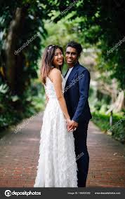 Portrait Interracial Couple Taking Wedding Photos Beautiful Park Day Indian  Stock Photo by ©mentatdgt 186409382