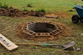 Maybe you would like to learn more about one of these? Round Fire Pit Go Back And Add The Mason Stone Toppers To Finish It Out With Cinder Blocks Backyard Fire In Ground Fire Pit Backyard Landscaping