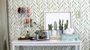 The walls are pained shades of gray and the ceiling have copper like tiles. Removable Wallpaper Review It S A Decor Game Changer Reviewed