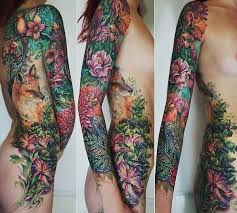 Several colors appear in this tattoo like sea green, pink, yellow, red, green, and more. Fox And Lizard Flowers Tattoo Sleeve Best Tattoo Ideas Gallery