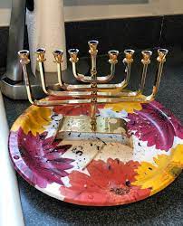 I usually put the candle holder in the refrigerator overnight. The Easiest Way To Clean Wax Off A Menorah Dogs Don T Eat Pizza