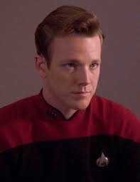 What was the in-universe explanation for Tom Paris looking exactly like  Nick Locarno in “Star Trek: Voyager?”