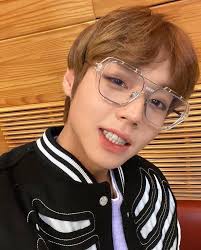 Taehyung was wearing his iconic hazel lenses