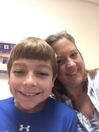 My 7 yr old son is in hospital. Spinal tumor. Needs cheering up. Toilet  door understood the assignment. Update: he's home safe and the tumour  turned out to be benign! Merry christmas