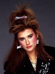 Ladies look so wild with these bands. 13 Hairstyles You Totally Wore In The 80s Allure