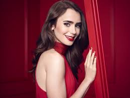 Red lipstick, truly bright intense red, is a bold fashion choice and it necessitates complimentary bold style and makeup choices. Wallpaper Lily Collins Women Model Actress Brunette Long Hair Dark Hair Red Lipstick Red Background Red Dress Smiling Red Nails 1440x1080 Lagito37 1765239 Hd Wallpapers Wallhere
