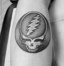 If you are a fan of small tattoos, this design is sure to steal your heart. 50 Grateful Dead Tattoo Designs For Men Rock Band Ink Ideas