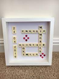 It is very unique and infuses the ambiance and surroundings with a class perfect for their home. Engagement Present Scrabble Art Diy Engagement Gifts Personalized Engagement Gifts Scrabble Letter Crafts