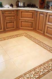 Kitchen idea of the day perfectly smooth transition from hardwood. Kitchen Floor Kitchen Floor Tile Kitchen Floor Tile Patterns Patterned Floor Tiles