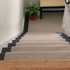 The Berber Carpet And The Dark Treads Make This Update Perfect Berber Carpet Wood And Carpet Stairs Carpet Stairs