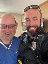 Officer's Doug Rahe and Kevin Cram from the Algona Police Department and  Deputy's Mike Sankey and Brian Runneburg from the Kossuth County Sheriff's  Office paid a visit to Peter for his 45th