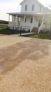 Chip And Seal Driveways Are Half The Cost Of Asphalt And Gives A Natural Look With Native Stone Asphalt Driveway Repair Driveway Repair Asphalt Driveway