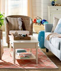 Tapered legs, clean lines and subtle tufting add fashionable flair, while the deep seat and winged back offer cozy comfort. Wicker Rattan Furniture Coastal Living Decor Design Ideas Shop The Look Coastal Decor Ideas Interior Design Diy Shopping