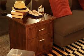 However, they are in popular at places where you can't take or keep a conventional refrigerator. Man Tables Mini Fridge End Tables