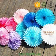 A bright wedding backdrop of colorful ribbons and colorful honeycomb pompoms. China Handmade Paper Hanging Decorations Wedding Paper Flowers China Fan And Paper Price
