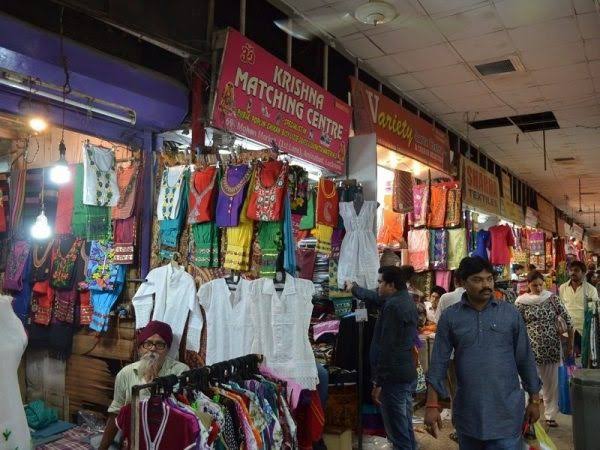 Vibrant shopping lanes in Aminabad Market, AI generated