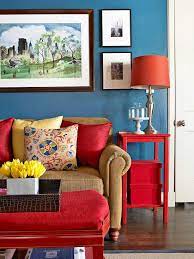 A Palette Of Blue Red And Yellow Make For A Dramatic And Lively Living Area Via Bhg Com Living Room Red Living Room Color Schemes Living Room Color