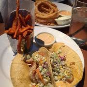 With offerings like cornmeal white fish, grilled tilapia & shrimp with mango salsa and blackened salmon and shrimp. Fish Tacos Menu Cheddar S Scratch Kitchen Thornton