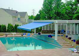 Retractable Awning For Pool Retractable Awnings Have Become Very Popular They Can Be Motorized Or Hand Cranked The Use Of This Awning Over A Pool Is Stunnin