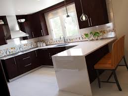 Another Modern Kitchen This One With A Sleek White Quartz Counter And Pops Of Orange On The Tile An Simple Kitchen Design Modern Kitchen Design Simple Kitchen
