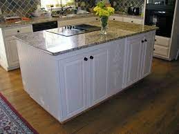 White kitchen island with a granite top. Decoration Tremendous Small Granite Top Kitchen Island With White Beadboard Paneling And Rai Custom Kitchen Island Kitchen Island Cabinets Kitchen Design Small