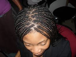 Pull the braids around the edges to make them visually larger and thicker. African Braid Hairstyles Design Press