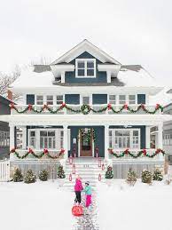 Dave and i prefer simple but we also appreciate the elaborate lights and note the stained glass window off the porch and lighted garland on the railings. 62 Best Christmas Front Porch Decorating Ideas Hgtv