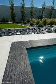piscine caron beton constructeur fabricant pierres naturelles amenagement jardin terrasse piscine terrasse autour piscine piscine amenagement paysager