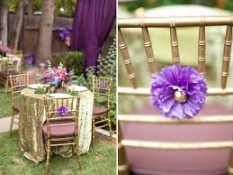 String lights are interspersed between the faux. Purple And Gold Bridal Shower Ideas