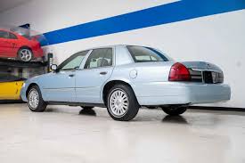 Image result for Light Ice Blue 2006 Crown Victoria