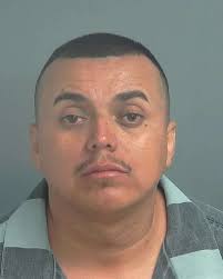 Banged-up biker charged for motorcycle crash