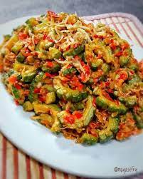 Pare dan ikan teri di tumis pedas pare dan ikan teri bumbu.cabe hijau,cabe rawit,bawang merah,bawang putih,gula,garam,kaldu. Resep Masakan Pare Yang Enak