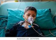 Child on a hospital bed receiving foto stock 2657075043 | Shutterstock