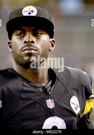 Pittsburgh Steelers quarterback Mike Vick celebrates defeating the San  Diego Chargers after an NFL football game Monday, Oct. 12, 2015, in San  Diego. The Steelers won 24-20. (AP Photo/Denis Poroy Stock Photo