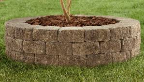 Concrete retaining wall block is another option to consider when building a raised garden bed. Build A Stone Raised Planting Bed