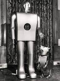 Seven feet tall and weighing 265 pounds, it could walk by voice command, speak about 700 words (using a 78 rpm. Elektro The Moto Man Had The Biggest Brain At The 1939 World S Fair Ieee Spectrum