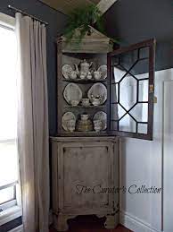 Antique french xv china hutch curio inlaid filigree curved glass lighted ornate. Antique Chippy Corner Hutch The Curators Collection