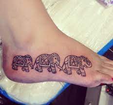 Clayton S Name Arched Over The Top Of The Elephant Tattoos For Daughters Trendy Tattoos Tattoos