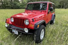 Image result for Flame Red 2005 Jeep