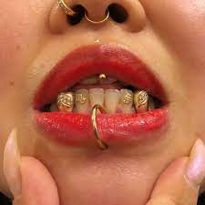 Chai Beauty On Instagram 18kt Yellow Gold Scorpio Gothic Lettering She Got Her Accessories On Lockkk Toothge Tooth Gem Teeth Jewelry Diamond Teeth