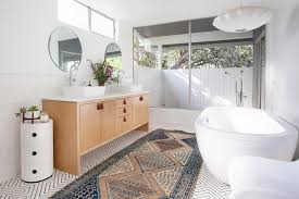 A plant gives a green, refreshing touch to contrast the clinical feel of white and gray tile. 99 Stylish Bathroom Design Ideas You Ll Love Hgtv