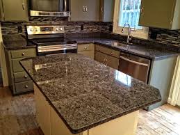 Sage Green Cabinets With Dark Granite And Glass Backsplash Glass Backsplash Green Cabinets Backsplash
