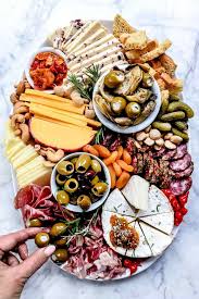 Christmas party ideas, christmas cocktail party, christmas tablescape, christmas dinner, christmas brunch, christmas cocktails, christmas appetizers for a crowd holiday appetizers healthy appetizers party appetizers kids nutrition health and nutrition christmas cocktail cheap. How To Make An Instagram Worthy Charcuterie Board Foodiecrush Com Party Food Appetizers Food Platters Party Food Platters
