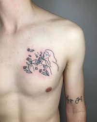 Love In Tattoos By Brit Abad Inkppl Small Chest Tattoos Chest Tattoo Design Tattoo Designs For Guys