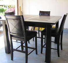 Brace piece/stretcher for added stability. Black Distressed Pub Style Dining Table Bar Dining Table Dining Table Online Pub Dining Set
