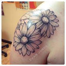 Evan Jones On Instagram Some Fun Simple Daisies On The Shoulder For Kellymerring Did Amazing For Her First T Flower Tattoo Shoulder Tattoos Shoulder Tattoo