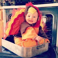 We found the best baby thanksgiving outfits for baby girls and baby boys to wear to the dinner table. Turkey Recipe 1 Cute Baby 1 Turkey Costume 1 Roasting Pan No Basting Required This Year I M Especial With Images Holiday Baby Thanksgiving Baby Thanksgiving Photos
